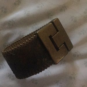 Gold and greenish black cuff